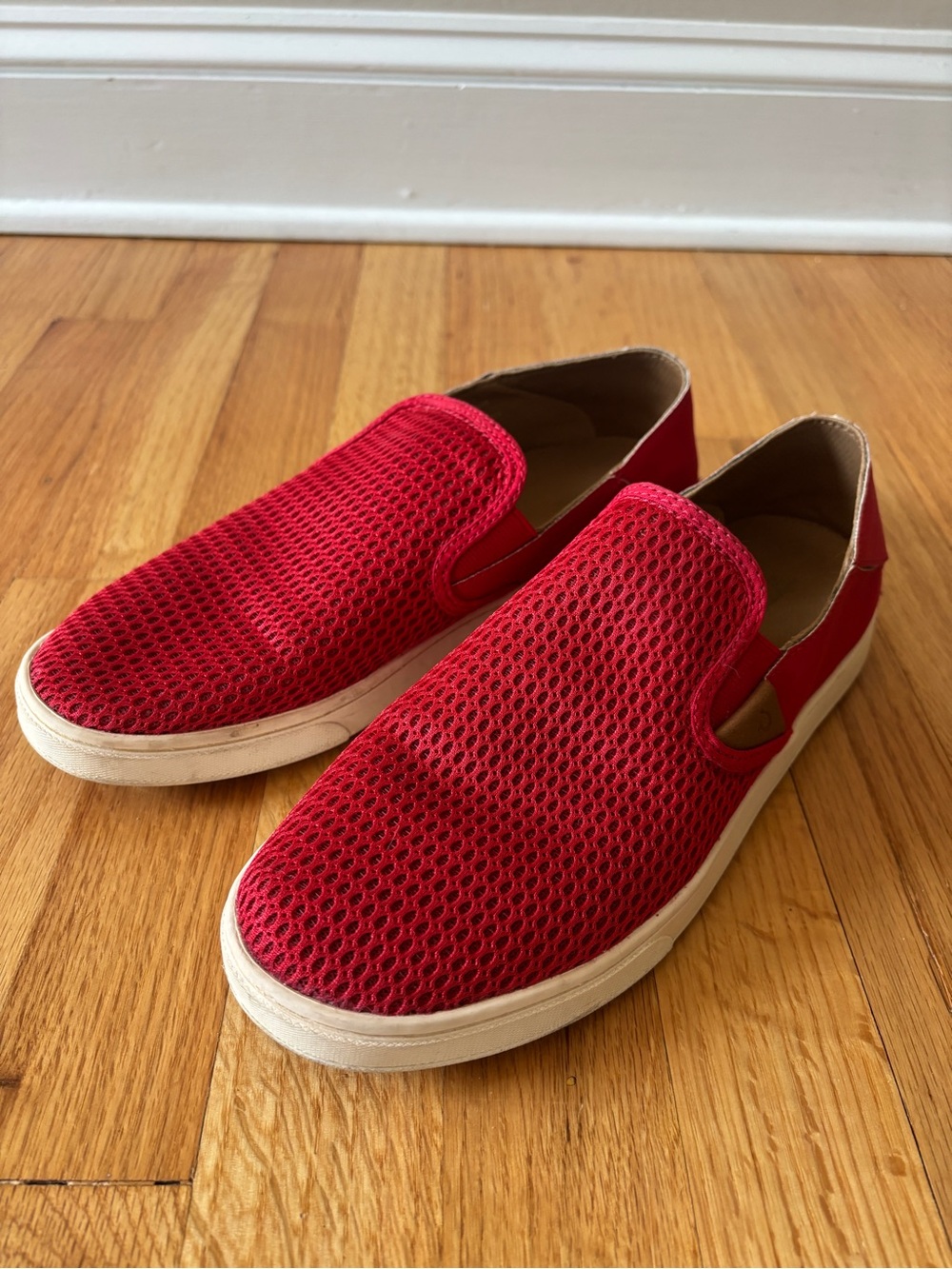 OluKai Peheua red mesh slip-ons